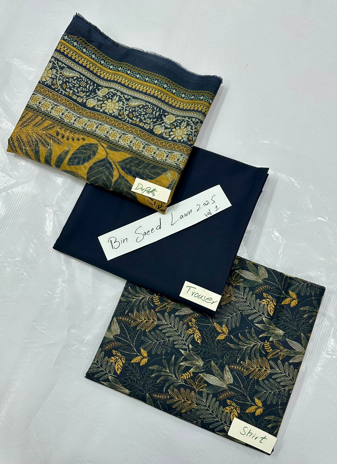 ORIGINAL BRAND BIN SAEED LAWN VOLUME NO 1 (Set -Pack of 14 Suits ) Market Boy