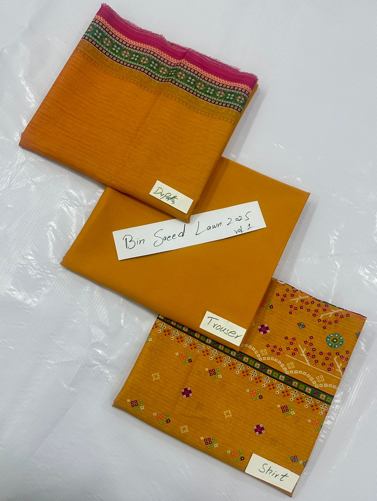 ORIGINAL BRAND BIN SAEED LAWN VOLUME NO 1 (Set -Pack of 7 Suits ) Category A Market Boy