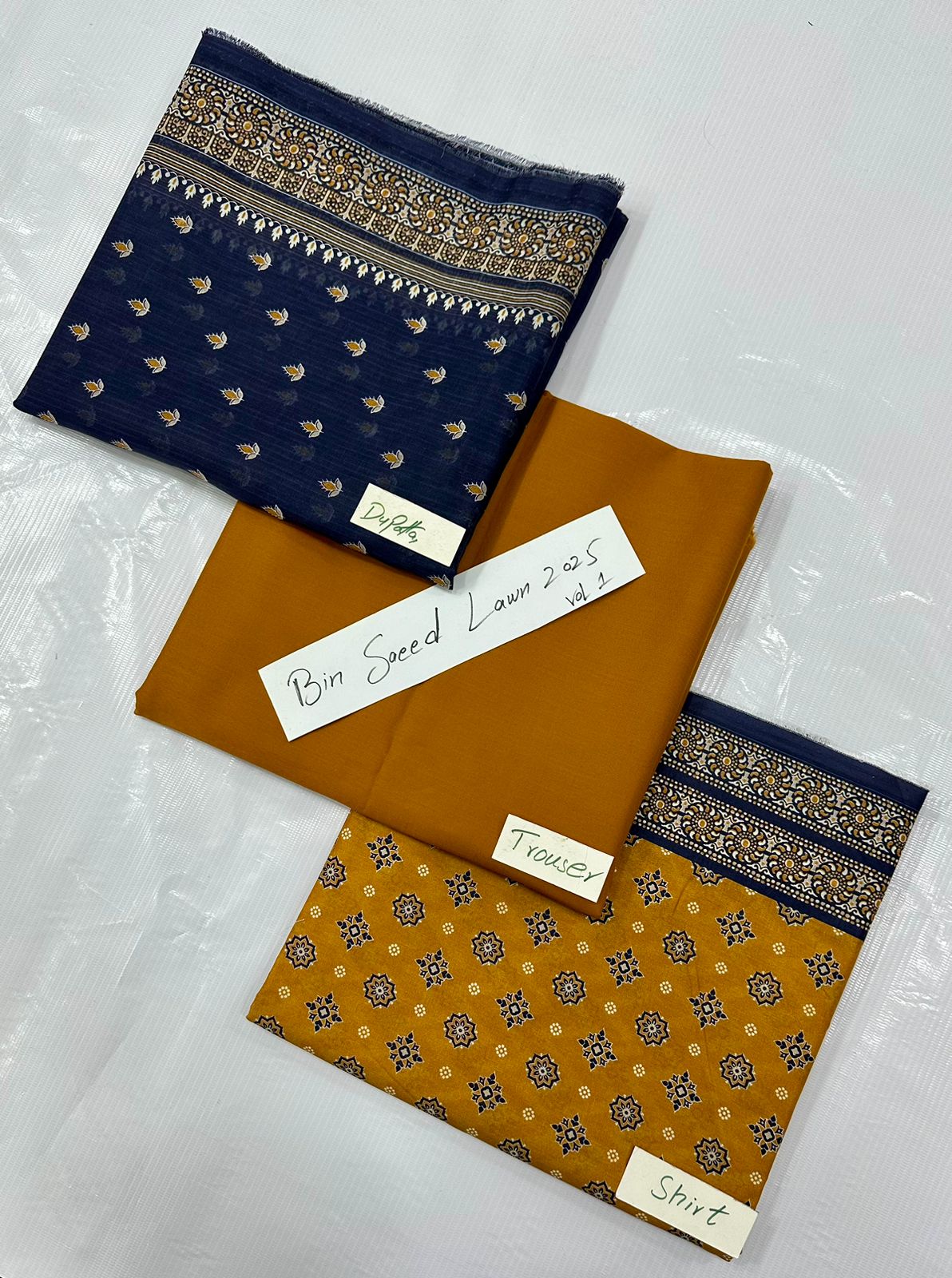 ORIGINAL BRAND BIN SAEED LAWN VOLUME NO 1 (Set -Pack of 14 Suits ) Market Boy